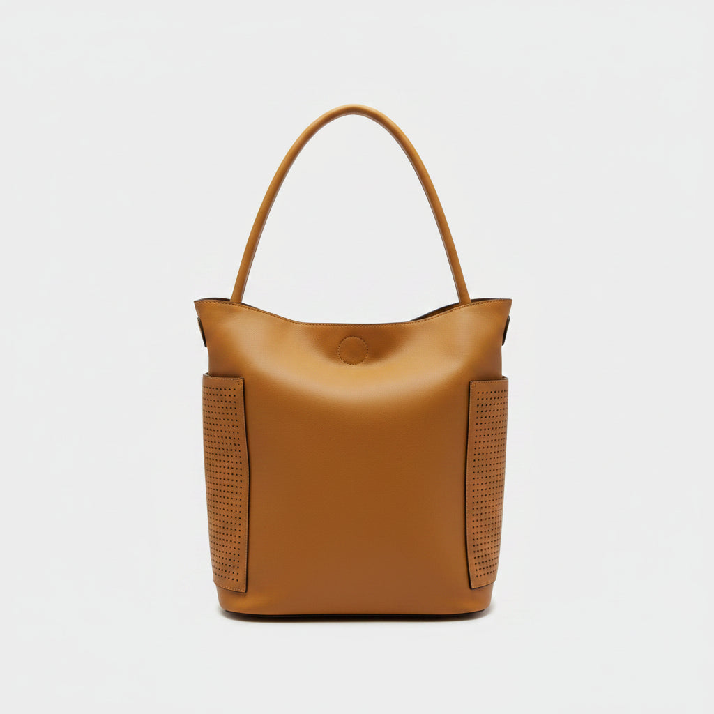 Yellow bucket bag with perforated details