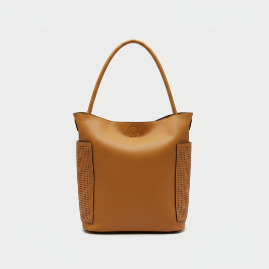 Yellow bucket bag with perforated details