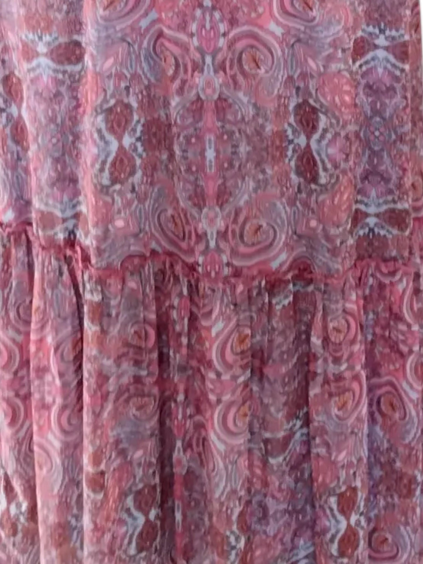 Circular Dress Collaborative pink and purple paisley print maxi dress with tiered hem and blouson sleeves.