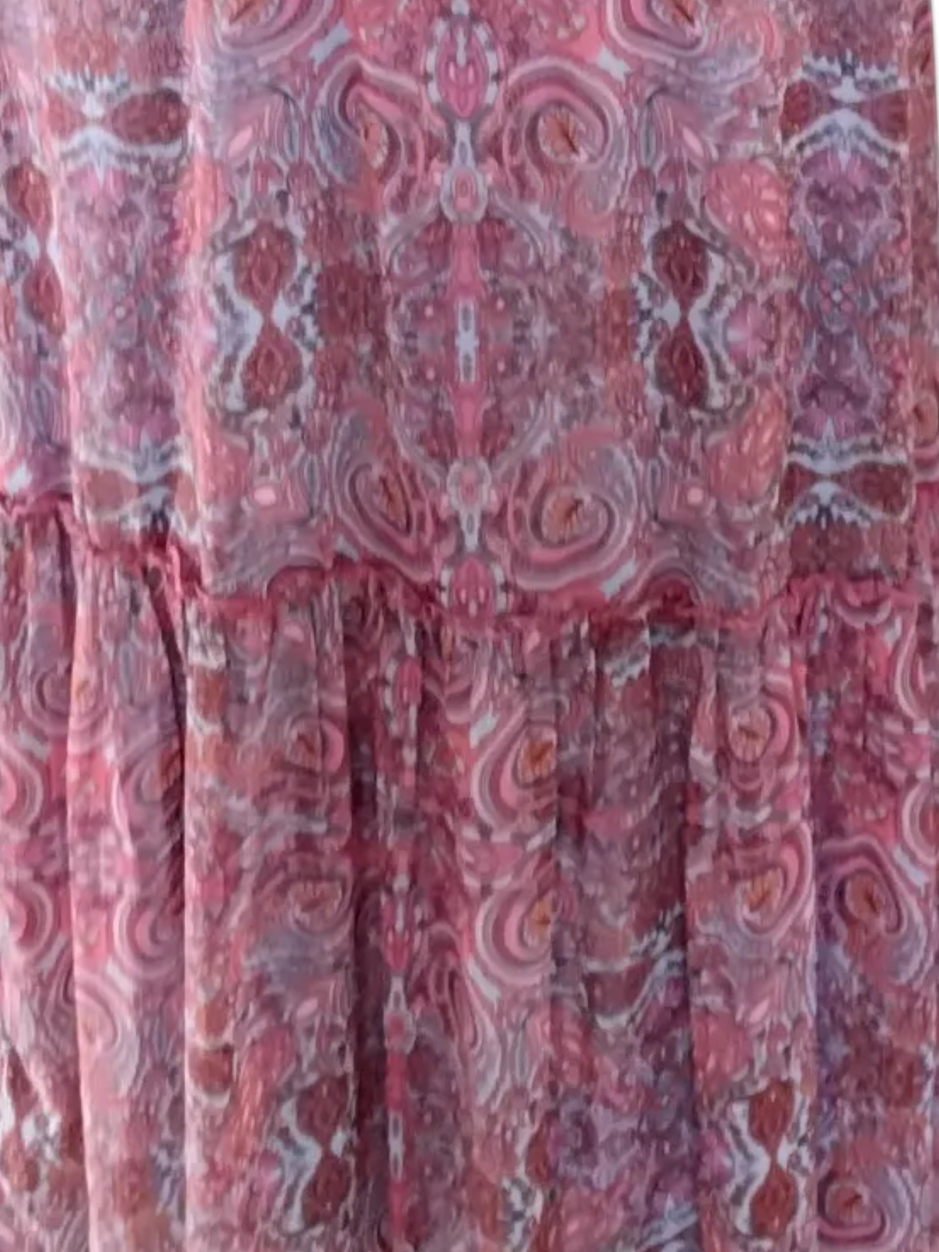 Circular Dress Collaborative pink and purple paisley print maxi dress with tiered hem and blouson sleeves.